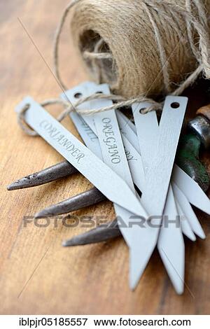 Stock Photo - Signs and hemp twine, plant markings, plant inscriptions. Fotosearch