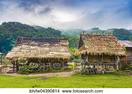 Simple houses, huts, Khmu Minority Village, Ban Nalan Tai, Nam Ha National Park, Luang Namtha, Laos, Asia View Large Photo Image Picture - Simple houses, huts, Khmu Minority Village, Ban Nalan Tai, Nam Ha National Park, Luang Namtha, Laos, Asia. Fotosearch