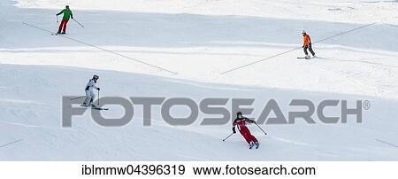 Skiers on slope, Brixen im Thale, Tyrol, Austria, Europe View Large Photo Image Stock Photo - Skiers on slope, Brixen im Thale, Tyrol, Austria, Europe. Fotosearch