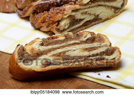 Stock Photo - Sliced, yeast-nut plait, yeast plait, Russian plait, nut plait. Fotosearch