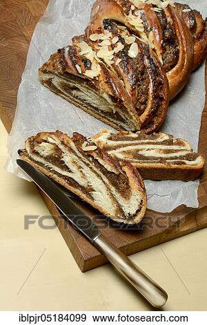 Stock Photo - Sliced, yeast-nut plait, yeast plait, Russian plait, nut plait. Fotosearch