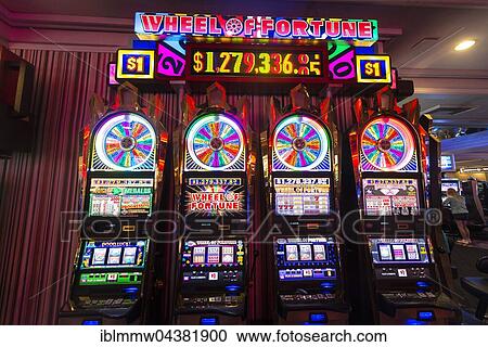 Stock Image - Slots, Wheel of Fortune at casino, Las Vegas, Nevada, USA, North America. Fotosearch