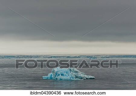 Small iceberg off the Austfonna glacier, Nordaustlandet, Svalbard, Spitsbergen, Norway, Europe View Large Photo Image Stock Photograph - Small iceberg off the Austfonna glacier, Nordaustlandet, Svalbard, Spitsbergen, Norway, Europe. Fotosearch
