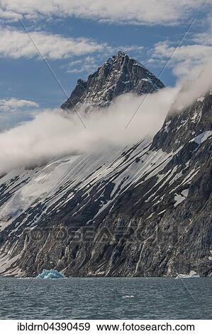 Stock Photo - Snowy mountain face, Woodfjorden, Svalbard, Spitsbergen, Norway, Europe. Fotosearch
