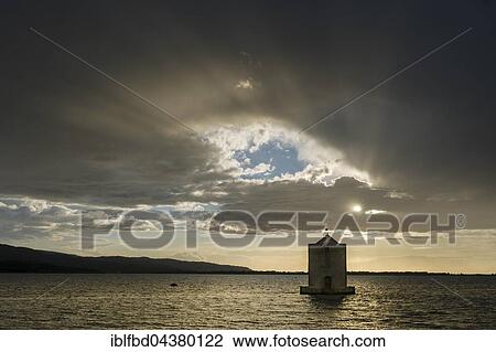 Spanish Windmill in lagoon, sunset, Orbetello, Tuscany, Italy, Europe View Large Photo Image Stock Image - Spanish Windmill in lagoon, sunset, Orbetello, Tuscany, Italy, Europe. Fotosearch