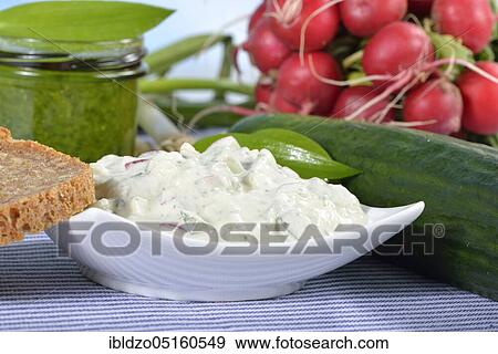 Spring dip with young onions (Allium cepa), wild garlic and radishes (Raphanus sativus sativus) View Large Photo Image Stock Photo - Spring dip with young onions (Allium cepa), wild garlic and radishes (Raphanus sativus sativus). Fotosearch