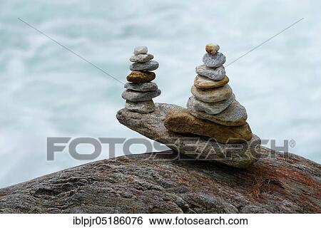 Stacked stones in front of running water, Valle Verzasca, Ticino, Switzerland, Europe View Large Photo Image Stock Photograph - Stacked stones in front of running water, Valle Verzasca, Ticino, Switzerland, Europe. Fotosearch