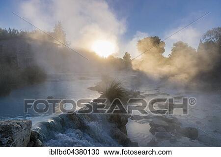 Steam is arising from the hot springs of Saturnia Therme in the morning, Saturnia, Tuscany, Italy, Europe View Large Photo Image Stock Image - Steam is arising from the hot springs of Saturnia Therme in the morning, Saturnia, Tuscany, Italy, Europe. Fotosearch