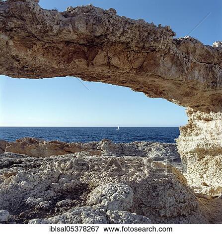 Stone bridge Punta sa Torre, Portinatx, Ibiza, Spain, Europe View Large Photo Image Stock Photo - Stone bridge Punta sa Torre, Portinatx, Ibiza, Spain, Europe. Fotosearch
