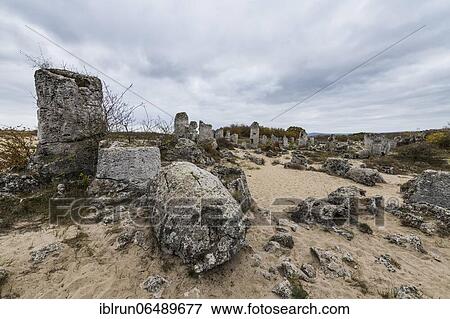Stone desert Pobiti Kamani rock phenomenon, near Varna, Bulgaria, Europe View Large Photo Image Stock Photo - Stone desert Pobiti Kamani rock phenomenon, near Varna, Bulgaria, Europe. Fotosearch