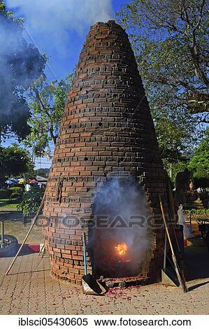 Stove for burning fireworks to honour the gods and to make wishes, Wat Chalong, temple on Phuket, Thailand, Asia View Large Photo Image Stock Photography - Stove for burning fireworks to honour the gods and to make wishes, Wat Chalong, temple on Phuket, Thailand, Asia. Fotosearch