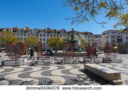 Stock Photo - Street art, red lettering LOVE, De mais curacao, movimento Daniela, Rossio Square, Lisbon, Portugal, Europe. Fotosearch