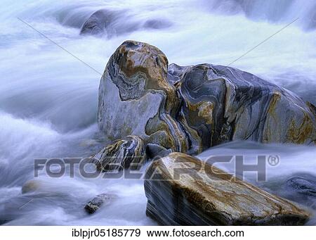 Structured stones in running water, Valle Verzasca, Verzasca Valley, Ticino, Switzerland, Europe View Large Photo Image Stock Photo - Structured stones in running water, Valle Verzasca, Verzasca Valley, Ticino, Switzerland, Europe. Fotosearch