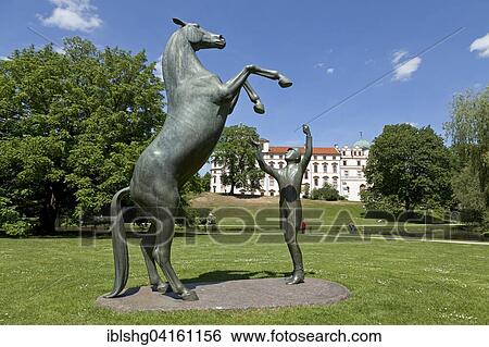 Stud Wohlklang, stallion sculpture in palace gardens, Celle Castle, Celle, Lower Saxony, Germany, Europe View Large Photo Image Stock Photograph - Stud Wohlklang, stallion sculpture in palace gardens, Celle Castle, Celle, Lower Saxony, Germany, Europe. Fotosearch