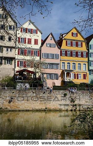 Stock Photography - Students on the banks of the Neckar River, Tübingen Old Town, Tübingen, Baden-Württemberg, Swabian Alb, Germany, Europe. Fotosearch