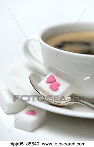 Sugar cube with sugar heart and cup of coffee, sugar consumption, sugar consumption View Large Photo Image Stock Image - Sugar cube with sugar heart and cup of coffee, sugar consumption, sugar consumption. Fotosearch