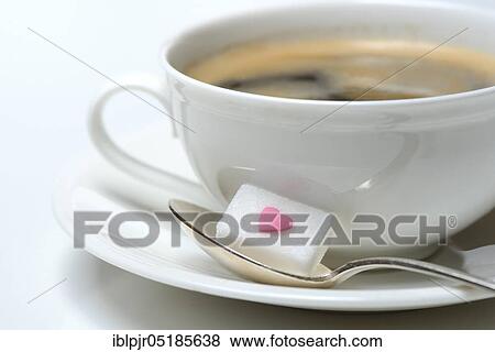 Sugar cube with sugar heart and cup of coffee, sugar consumption, sugar consumption View Large Photo Image Stock Photo - Sugar cube with sugar heart and cup of coffee, sugar consumption, sugar consumption. Fotosearch