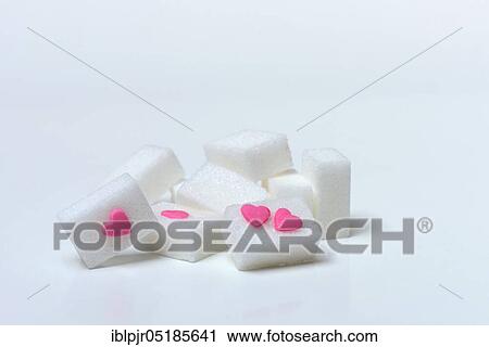 Sugar cubes with sugar heart, sugar consumption, sugar consumption View Large Photo Image Stock Image - Sugar cubes with sugar heart, sugar consumption, sugar consumption. Fotosearch