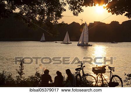 Sunset on the lake Alster, Hamburg, Germany, Europe View Large Photo Image Stock Photo - Sunset on the lake Alster, Hamburg, Germany, Europe. Fotosearch