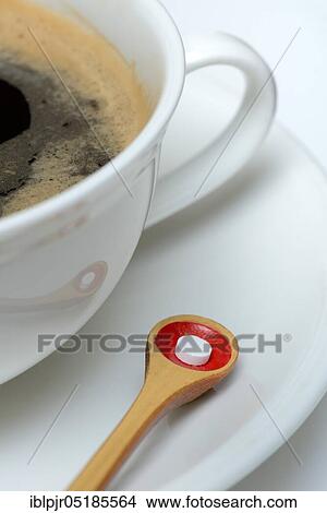 Sweetener tablet and coffee cup View Large Photo Image Picture - Sweetener tablet and coffee cup. Fotosearch
