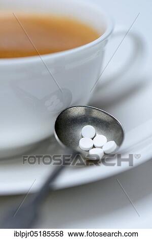 Sweetener tablets and coffee cup View Large Photo Image Stock Photo - Sweetener tablets and coffee cup. Fotosearch