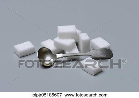 Sweetener tablets and sugar cubes, white sugar View Large Photo Image Stock Photo - Sweetener tablets and sugar cubes, white sugar. Fotosearch