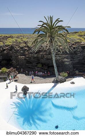 Swimming pool, lava cave Jameos de Aqua, by Cesar Manrique, Lanzarote, Canary Islands, Spain, Europe View Large Photo Image Stock Image - Swimming pool, lava cave Jameos de Aqua, by Cesar Manrique, Lanzarote, Canary Islands, Spain, Europe. Fotosearch