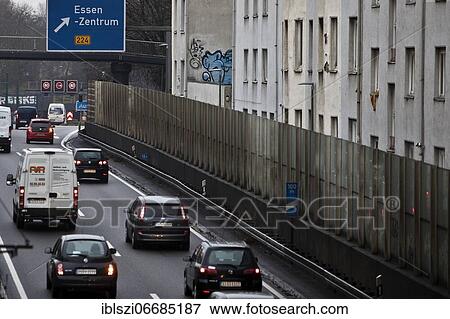 The A 40 motorway goes right through the city past rental apartments, Essen, Ruhr Area, North Rhine-Westphalia, Germany, Europe View Large Photo Image Stock Photo - The A 40 motorway goes right through the city past rental apartments, Essen, Ruhr Area, North Rhine-Westphalia, Germany, Europe. Fotosearch