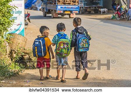 Three little boys going to school, Nong Khiaw, Luang Prabang Province, Laos, Asia View Large Photo Image Picture - Three little boys going to school, Nong Khiaw, Luang Prabang Province, Laos, Asia. Fotosearch