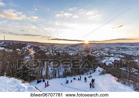 Stock Image - Toboggan run at the Uhlandshöhe in winter, tobogganing, television tower, city center, city view, Stuttgart, Baden-Württemberg, Germany, Europe. Fotosearch