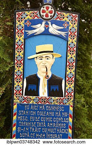 Tombstone, a man in traditional clothes, The Merry Cemetery, Cimitirul Vesel, Săpânța, Maramares, Northern Transylvania, Romania, Europe View Large Photo Image Stock Image - Tombstone, a man in traditional clothes, The Merry Cemetery, Cimitirul Vesel, Săpânța, Maramares, Northern Transylvania, Romania, Europe. Fotosearch
