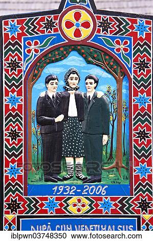 Tombstone of a mother showing her with her sons, The Merry Cemetery, Cimitirul Vesel, Săpânța, Maramares, Northern Transylvania, Romania, Europe View Large Photo Image Stock Image - Tombstone of a mother showing her with her sons, The Merry Cemetery, Cimitirul Vesel, Săpânța, Maramares, Northern Transylvania, Romania, Europe. Fotosearch