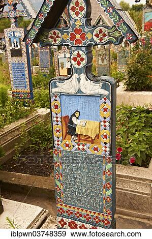 Tombstone, old women sitting at her table, The Merry Cemetery, Cimitirul Vesel, Săpânța, Maramares, Northern Transylvania, Romania, Europe View Large Photo Image Stock Photo - Tombstone, old women sitting at her table, The Merry Cemetery, Cimitirul Vesel, Săpânța, Maramares, Northern Transylvania, Romania, Europe. Fotosearch