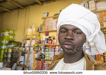 Toubou man in a store, Sahel, Chad, Africa View Large Photo Image Stock Photography - Toubou man in a store, Sahel, Chad, Africa. Fotosearch