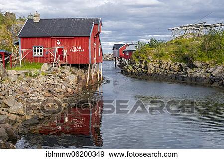 Stock Photo - Traditional red stilt houses, typical fishermen's huts, Å i Lofoten, Lofoten, Nordland, Norway, Europe. Fotosearch