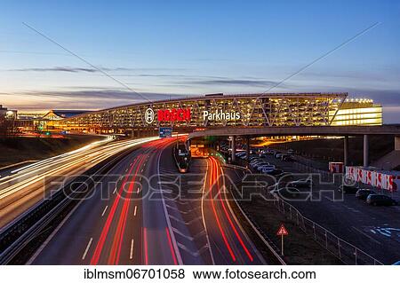 Traffic motorway A8 Messe Stuttgart Bosch parking garage movement speed, Germany, Europe View Large Photo Image Stock Photo - Traffic motorway A8 Messe Stuttgart Bosch parking garage movement speed, Germany, Europe. Fotosearch