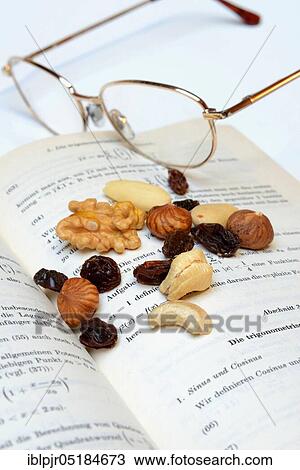 Stock Image - Trail mix, nut mix, nuts, cashews, almonds, raisins, hazelnuts. Fotosearch
