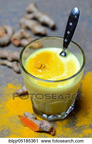Turmeric-milk in glass, -root View Large Photo Image Stock Image - Turmeric-milk in glass, -root. Fotosearch