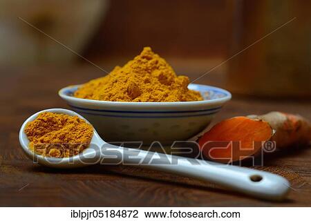 Stock Image - Turmericpowder and ( Curcuma longa) salsify. Fotosearch