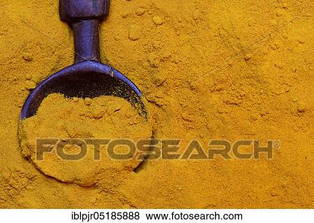 Turmericpowder ( Curcuma longa) with wooden spoon View Large Photo Image Stock Photo - Turmericpowder ( Curcuma longa) with wooden spoon. Fotosearch