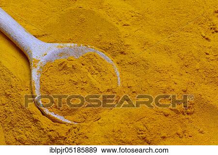 Turmericpowder ( Curcuma longa) with wooden spoon View Large Photo Image Stock Photo - Turmericpowder ( Curcuma longa) with wooden spoon. Fotosearch