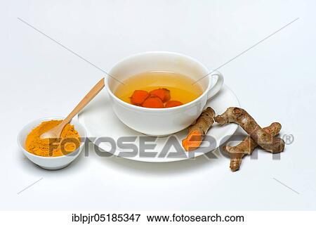Turmerictea in cup, roots and bowl with powder, -tea View Large Photo Image Stock Photo - Turmerictea in cup, roots and bowl with powder, -tea. Fotosearch