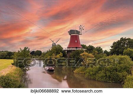 Twin mills at the old Greetsiel lowland, Greetsiel, Lower Saxony, Germany, Europe View Large Photo Image Stock Image - Twin mills at the old Greetsiel lowland, Greetsiel, Lower Saxony, Germany, Europe. Fotosearch