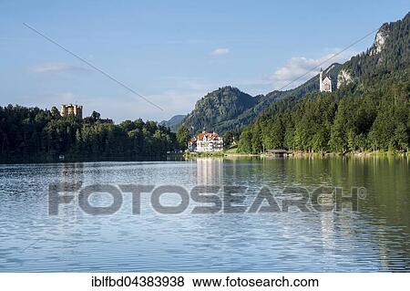 Two castels, Castle Neuschwanstein and Castel Hohenschwangau seen across the lake Alpsee, Hohenschwangau, Bavaria, Germany, Europe View Large Photo Image Stock Photo - Two castels, Castle Neuschwanstein and Castel Hohenschwangau seen across the lake Alpsee, Hohenschwangau, Bavaria, Germany, Europe. Fotosearch