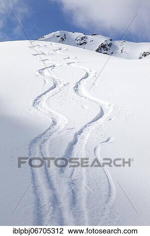 Two lonely ski tracks in front of a blue sky, Kühtai, Tyrol, Austria, Europe View Large Photo Image Stock Image - Two lonely ski tracks in front of a blue sky, Kühtai, Tyrol, Austria, Europe. Fotosearch