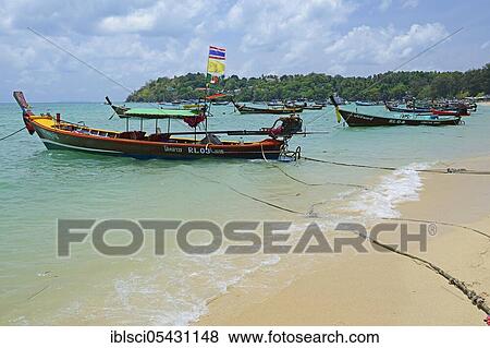 Typical colorful longtail boats, Rawai Beach, Phuket, Thailand, Asia View Large Photo Image Stock Photo - Typical colorful longtail boats, Rawai Beach, Phuket, Thailand, Asia. Fotosearch