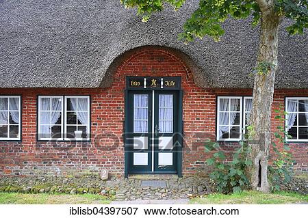 Typical entrance, old Frisian house, thatched roof, Keitum, Sylt, North Frisian Islands, North Frisia, Schleswig-Holstein, Germany, Europe View Large Photo Image Stock Photo - Typical entrance, old Frisian house, thatched roof, Keitum, Sylt, North Frisian Islands, North Frisia, Schleswig-Holstein, Germany, Europe. Fotosearch