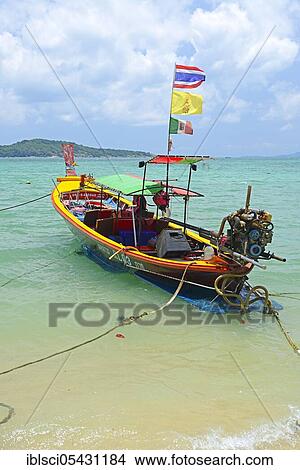 Picture - Typical longtail boat, Rawai Beach, Phuket, Thailand, Asia. Fotosearch
