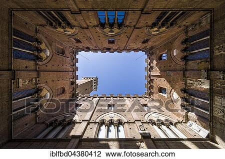 Upwards view of Torre del Mangia from inside Palazzo Pubblico, Siena, Tuscany, Italy, Europe View Large Photo Image Stock Image - Upwards view of Torre del Mangia from inside Palazzo Pubblico, Siena, Tuscany, Italy, Europe. Fotosearch