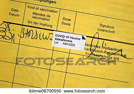 Stock Image - Vaccination certificate after vaccination with AstraZeneca against Covid-19, Sars-CoV-2, Corona crisis, Stuttgart, Baden-Württemberg, Germany, Europe. Fotosearch